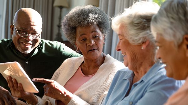 four older adults in their homes chatting together about old memories to help get rid of loneliness